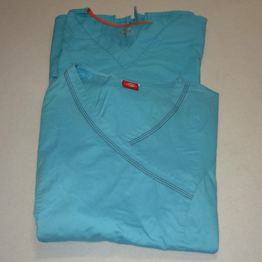 Two turquoise scrub tops